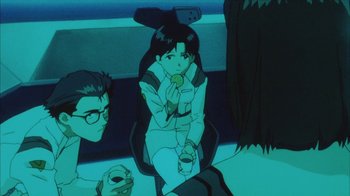 Movie still from “Neon Genesis Evangelion: Death & Rebirth” (1997), directed by Tensai Okamura – An animated scene of a girl sitting in a chair; Medium shot, High angle