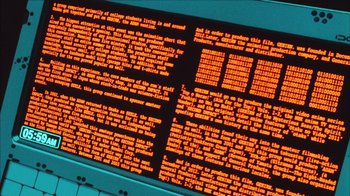 Movie still from “Neon Genesis Evangelion: Death & Rebirth” (1997), directed by Tensai Okamura – A computer screen with a lot of text on it; Extreme Close Up shot, High angle