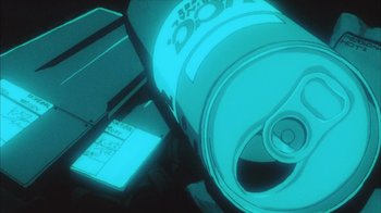 Movie still from “Neon Genesis Evangelion: Death & Rebirth” (1997), directed by Tensai Okamura – A can of soda is lit up in the dark; Extreme Close Up shot, Overhead angle