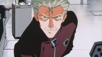 Movie still from “Neon Genesis Evangelion: Death & Rebirth” (1997), directed by Tensai Okamura – An older man with spiky gray hair is looking at the camera; Close Up shot, Low angle