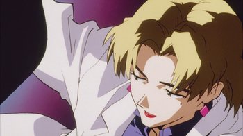 Movie still from “Neon Genesis Evangelion: Death & Rebirth” (1997), directed by Tensai Okamura – A person with blond hair; Extreme Close Up shot, Low angle