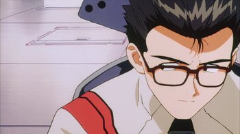 Movie still from “Neon Genesis Evangelion: Death & Rebirth” (1997), directed by Tensai Okamura – A person's face with glasses; Close Up shot, Low angle