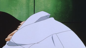 Movie still from “Neon Genesis Evangelion: Death & Rebirth” (1997), directed by Tensai Okamura – View of a folded sheet of paper; Close Up shot, High angle