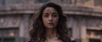 Movie still from “Gangubai Kathiawadi” (2022), directed by Sanjay Leela Bhansali – A woman with a nose piercing and a nose ring; Close Up shot, Low angle