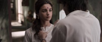 Movie still from “Gangubai Kathiawadi” (2022), directed by Sanjay Leela Bhansali – A young woman getting ready for an indian wedding ceremony; Close Up shot, Over the shoulder angle