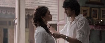 Movie still from “Gangubai Kathiawadi” (2022), directed by Sanjay Leela Bhansali – A man and a woman standing next to each other; Close Up shot, Low angle