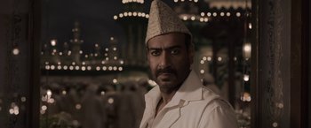 Movie still from “Gangubai Kathiawadi” (2022), directed by Sanjay Leela Bhansali – A person wearing a hat; Close Up shot, Low angle