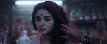Movie still from “Gangubai Kathiawadi” (2022), directed by Sanjay Leela Bhansali – A woman with a nose ring on her forehead; Close Up shot, Low angle