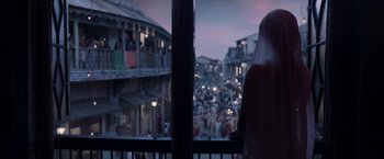 Movie still from “Gangubai Kathiawadi” (2022), directed by Sanjay Leela Bhansali – A view from a balcony of a crowd of people; Wide shot, Over the shoulder angle