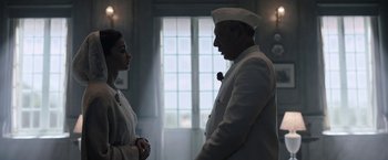 Movie still from “Gangubai Kathiawadi” (2022), directed by Sanjay Leela Bhansali – A man and a woman in a white suit; Medium shot, Low angle