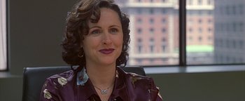 Movie still from “Never Been Kissed” (1999), directed by Raja Gosnell – A person sitting in front of a window; Close Up shot, Over the shoulder angle