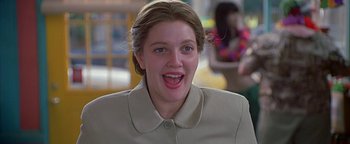 Movie still from “Never Been Kissed” (1999), directed by Raja Gosnell – A young woman with her mouth wide open; Close Up shot, Low angle