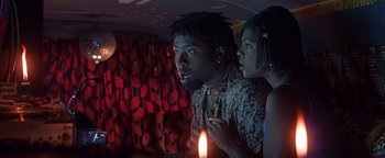 Movie still from “Never Been Kissed” (1999), directed by Raja Gosnell – A man and a woman standing next to each other; Close Up shot, Low angle