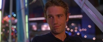 Movie still from “Never Been Kissed” (1999), directed by Raja Gosnell – A person wearing a black shirt; Close Up shot, Low angle