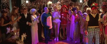 Movie still from “Never Been Kissed” (1999), directed by Raja Gosnell – A group of people dressed up in costumes for halloween; Wide shot, High angle