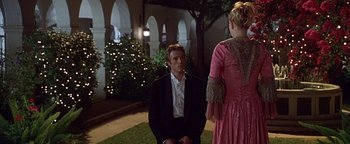Movie still from “Never Been Kissed” (1999), directed by Raja Gosnell – A man and a woman dressed in formal wear; Medium shot, Over the shoulder angle