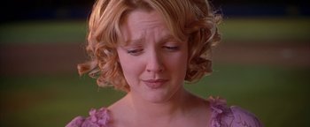 Movie still from “Never Been Kissed” (1999), directed by Raja Gosnell – A person with her eyes closed; Close Up shot, Over the shoulder angle