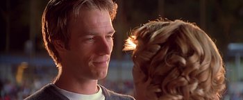 Movie still from “Never Been Kissed” (1999), directed by Raja Gosnell – A man and a woman face to face; Close Up shot, Low angle