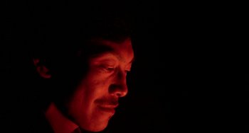 Movie still from “Never Cry Wolf” (1983), directed by Carroll Ballard – A person's face in the dark; Close Up shot, Low angle