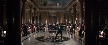 Movie still from “Never Say Never Again” (1983), directed by Irvin Kershner – A couple of people that are dancing in a room; Extreme Wide shot, High angle