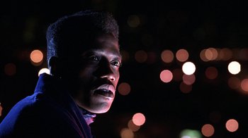 A person's face at night