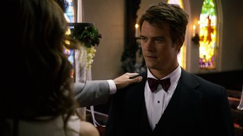 Movie still from “New Year's Eve” (2011), directed by Garry Marshall – A man in a suit and a woman in a dress; Close Up shot, Over the shoulder angle
