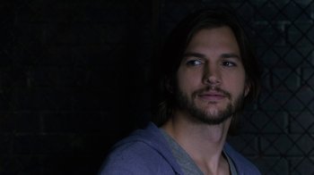 Movie still from “New Year's Eve” (2011), directed by Garry Marshall – A person with long hair; Close Up shot, Over the shoulder angle