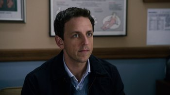 Movie still from “New Year's Eve” (2011), directed by Garry Marshall – A person sitting in a room; Close Up shot, Over the shoulder angle