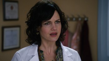 Movie still from “New Year's Eve” (2011), directed by Garry Marshall – A person wearing a lab coat; Close Up shot, Over the shoulder angle