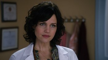 Movie still from “New Year's Eve” (2011), directed by Garry Marshall – A person wearing a lab coat; Close Up shot, Low angle