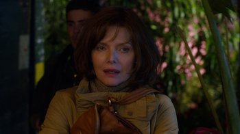 Movie still from “New Year's Eve” (2011), directed by Garry Marshall – A person wearing a jacket; Close Up shot, Over the shoulder angle