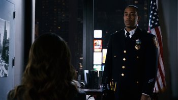 Movie still from “New Year's Eve” (2011), directed by Garry Marshall – A man standing in front of a woman in front of a mirror; Medium shot, Over the shoulder angle