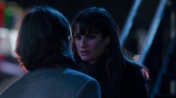 Movie still from “New Year's Eve” (2011), directed by Garry Marshall – A woman with long black hair is talking to another woman; Close Up shot, Over the shoulder angle
