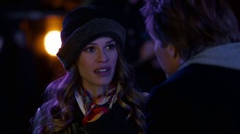 Movie still from “New Year's Eve” (2011), directed by Garry Marshall – A person wearing a hat; Close Up shot, Over the shoulder angle