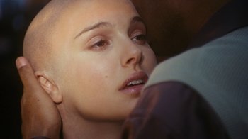 Movie still from “New York, I Love You” (2008), directed by Wen Jiang – A person with a bald head; Close Up shot, Over the shoulder angle