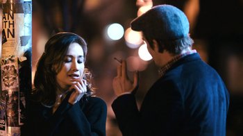 Movie still from “New York, I Love You” (2008), directed by Wen Jiang – A man and a woman are smoking a cigarette together; Close Up shot, Over the shoulder angle