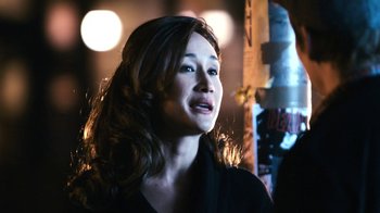 Movie still from “New York, I Love You” (2008), directed by Wen Jiang – A person with long hair; Close Up shot, Over the shoulder angle