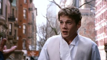 Movie still from “New York, I Love You” (2008), directed by Wen Jiang – A man in a white shirt and a white tie; Close Up shot, Over the shoulder angle
