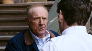 Movie still from “New York, I Love You” (2008), directed by Wen Jiang – An older man talking to a younger man outside; Close Up shot, Over the shoulder angle