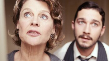 Movie still from “New York, I Love You” (2008), directed by Wen Jiang – A man and a woman looking at the camera; Close Up shot, Over the shoulder angle