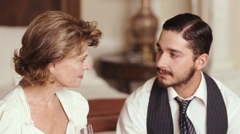 Movie still from “New York, I Love You” (2008), directed by Wen Jiang – A man and a woman sitting at a dinner table talking; Close Up shot, Over the shoulder angle