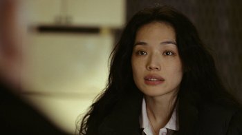 Movie still from “New York, I Love You” (2008), directed by Wen Jiang – A person with long hair; Close Up shot, Over the shoulder angle