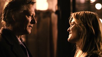 Movie still from “New York, I Love You” (2008), directed by Wen Jiang – Two people face to face in a dark room; Close Up shot, Over the shoulder angle