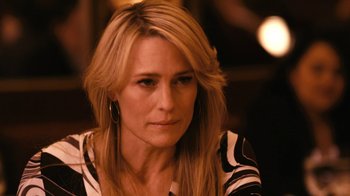 Movie still from “New York, I Love You” (2008), directed by Wen Jiang – A person with long blonde hair; Close Up shot, Over the shoulder angle