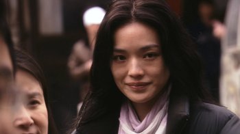 Movie still from “New York, I Love You” (2008), directed by Wen Jiang – A person with long black hair; Close Up shot, Low angle