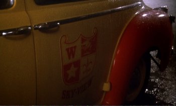 View of the side of a car with a star on it