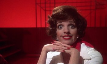 Movie still from “New York, New York” (1977), directed by Martin Scorsese – A person with her hands on her chin; Close Up shot, Low angle