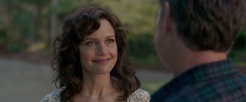 Movie still from “Gerald's Game” (2017), directed by Mike Flanagan – A person smiling at a person; Close Up shot, Over the shoulder angle