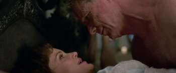 Movie still from “Gerald's Game” (2017), directed by Mike Flanagan – An older man and a younger woman looking at each other; Close Up shot, Overhead angle