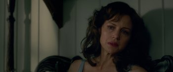 Movie still from “Gerald's Game” (2017), directed by Mike Flanagan – A person sitting in a room; Close Up shot, Over the shoulder angle